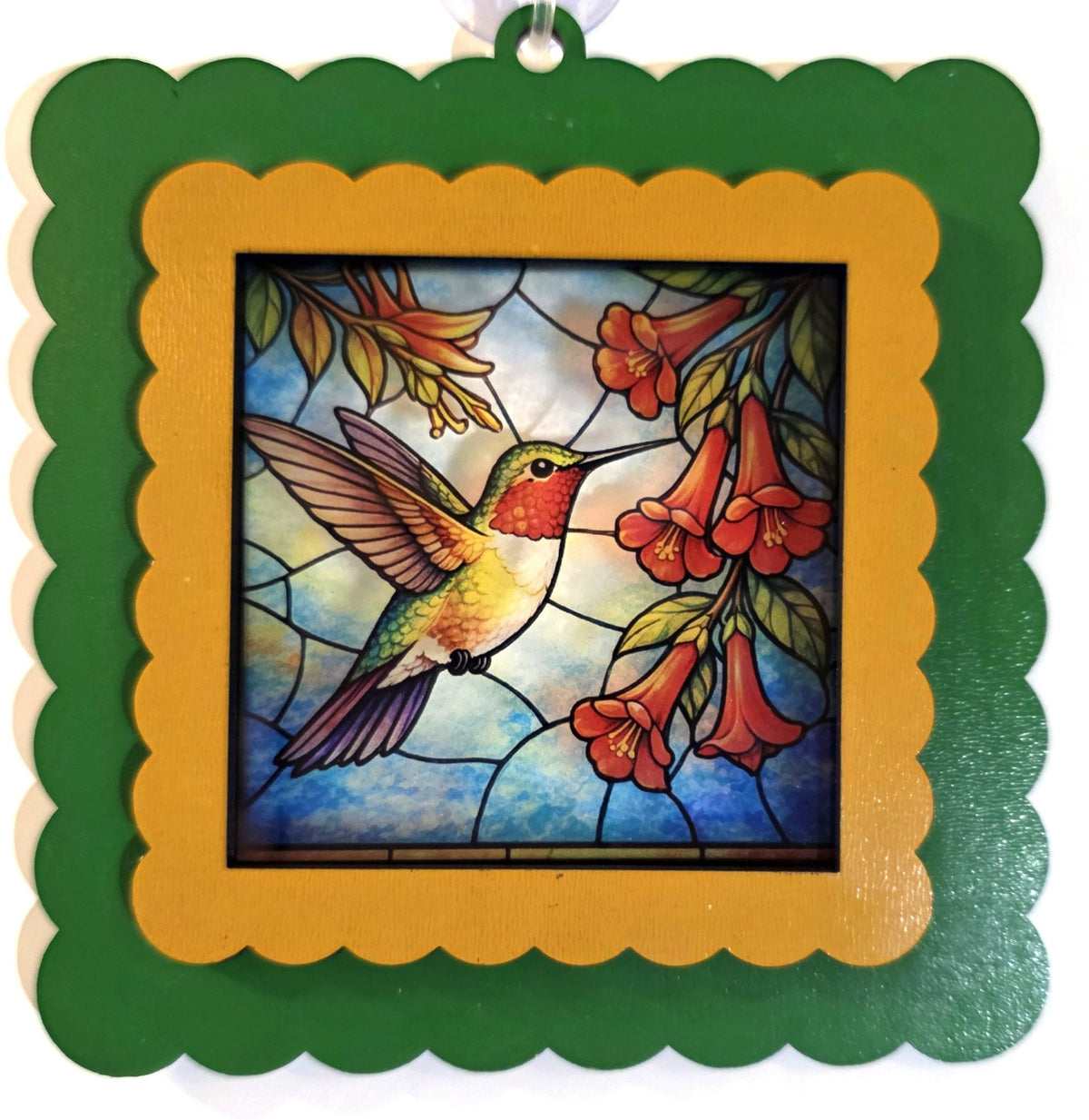 Laser-cut wood interchangeable suncatcher frame in green and gold, 5.5 inches, with holiday insert, by Illuminated Engraving