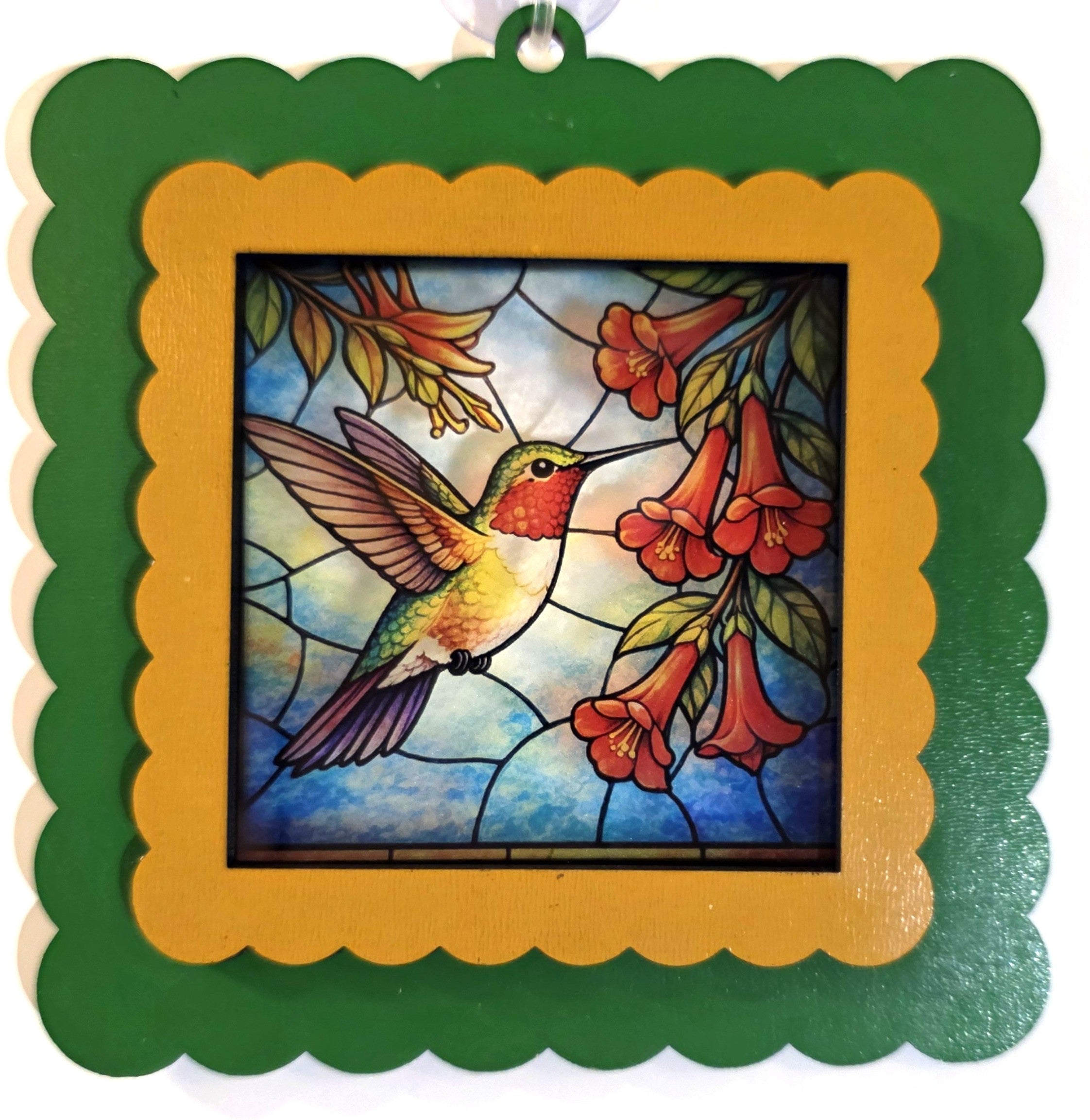 Laser-cut wood interchangeable suncatcher frame in green and gold, 5.5 inches, with holiday insert, by Illuminated Engraving